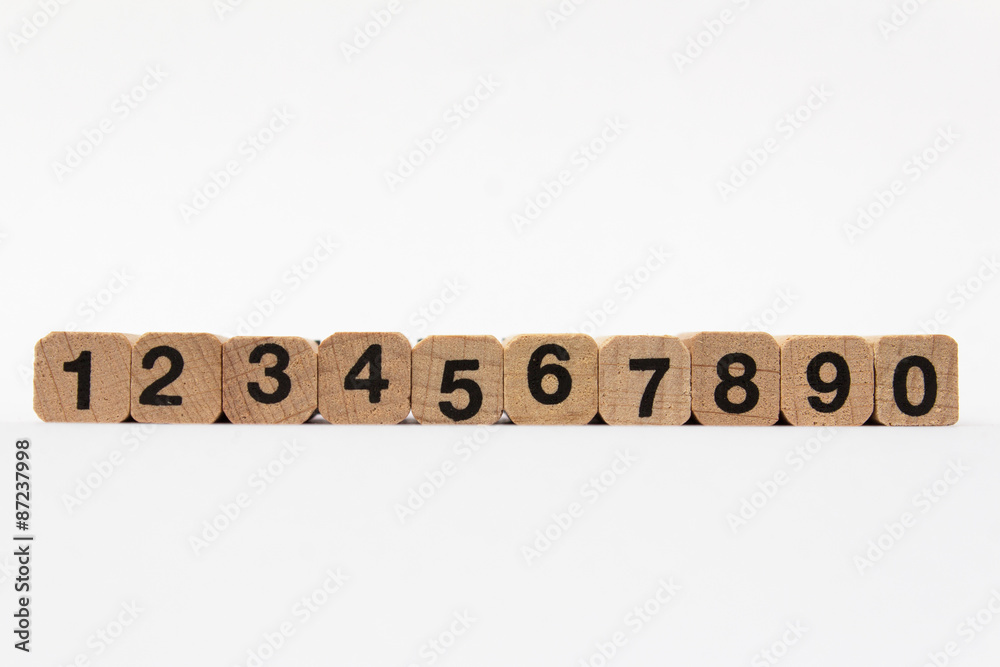 Numbers one to ten on wood cubes isolated on white background Numbers one to ten on wood cubes isolated on white background