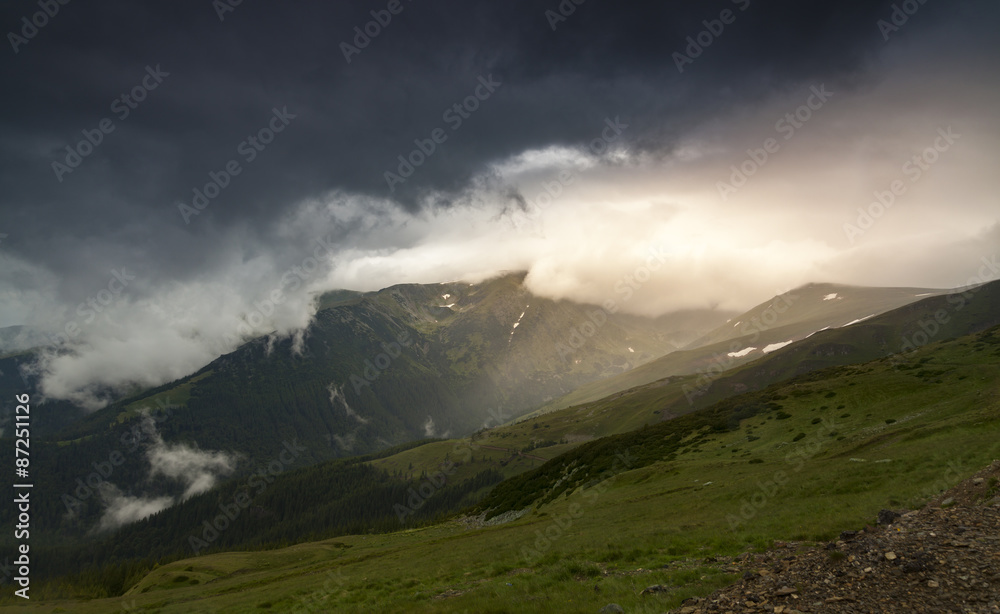 Dramatic light into the mountain