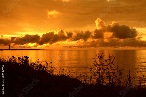 Beautiful golden sunset over sea photo