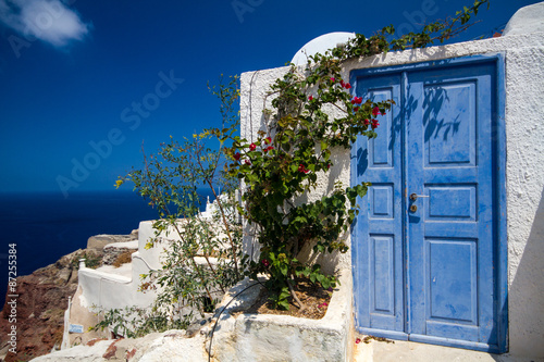 Blue door entrance in OIa, Santorini