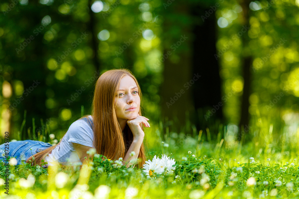 Beautiful smiling red-haired young woman Beautiful smiling red-haired young woman