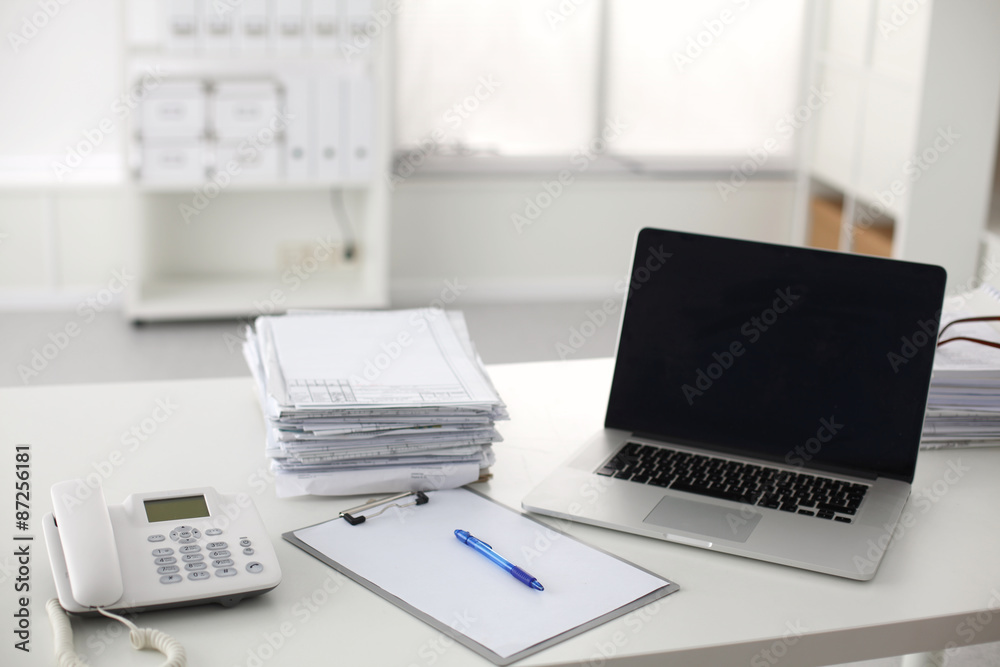 office desk a stack of computer paper reports work forms office desk a stack of computer paper reports work forms