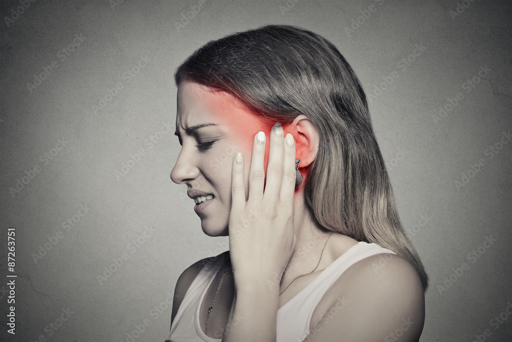 Fototapeta premium side profile sick female having ear pain touching painful head