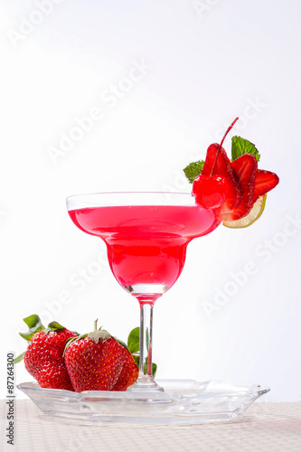 Strawberry cocktail with berry in glass isolated on white backgr