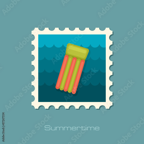 Floating mattress on beach flat stamp