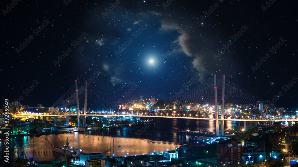 City landscape at night with sky with stars and nebula.