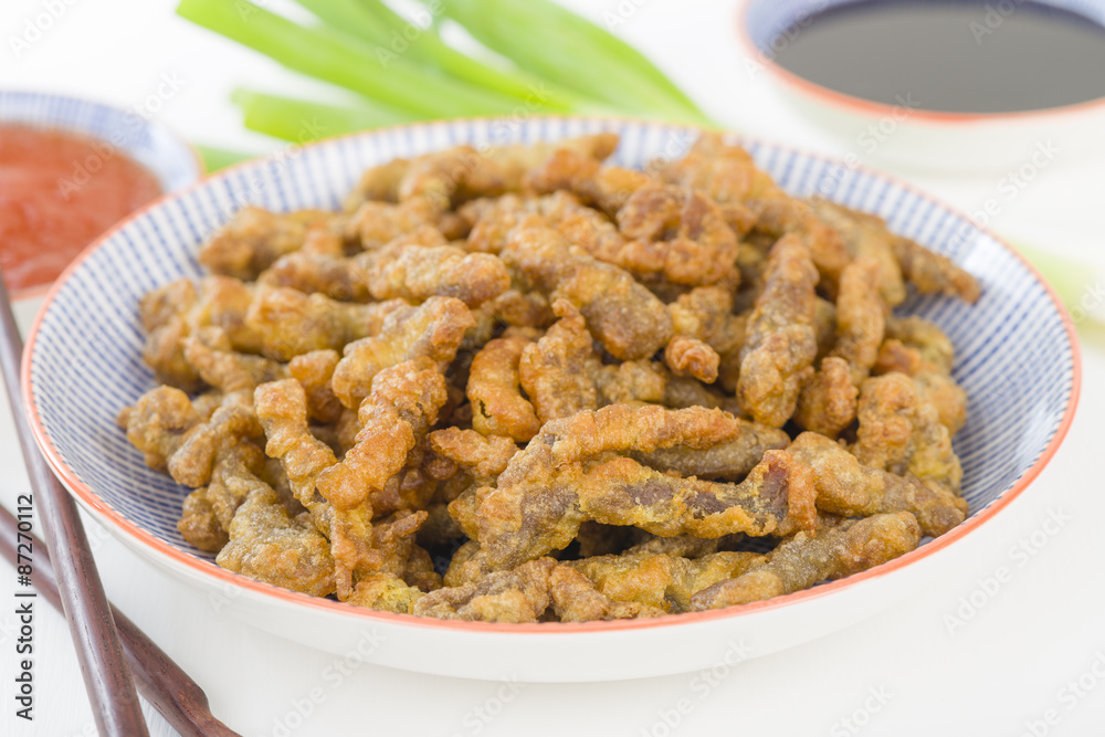 Crispy Beef - Oriental battered and deep-fried beef with sweet chilli sauce. Crispy Beef - Oriental battered and deep-fried beef with sweet chilli sauce.