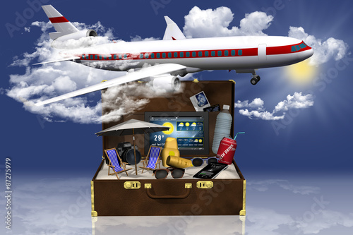 Aereo valigia vacanza_004
Aeroplano in cielo, fra le nubi sorvola una valigia contenente oggetti che richiamano la spiaggia: sabbia, ombrellone, sdraio, occhiali e creme solari ecc. photo