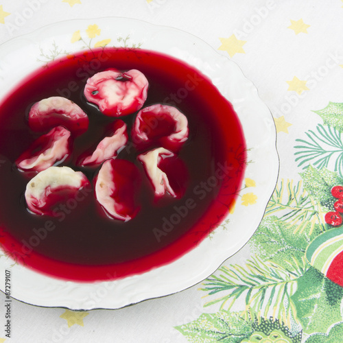 Red borsch with uszka, traditional Christmas Eve dish  photo