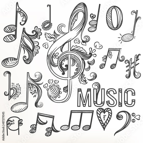 Sketchy doodle set treble clef and other music symbols photo