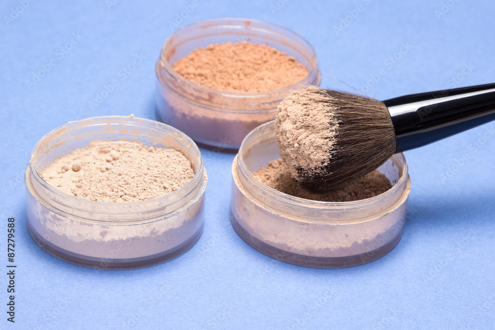 Different shades of loose cosmetic powder Different shades of loose cosmetic powder