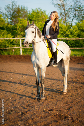 Horsewoman at hippodrome and blue sky © sam73nz