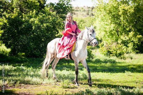 Horsewoman on white horse © sam73nz