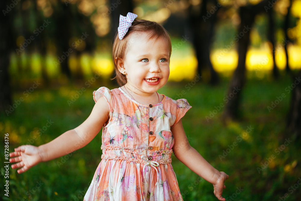 Outdoor portrait of adorable smiling little girl in summer day Outdoor portrait of adorable smiling little girl in summer day