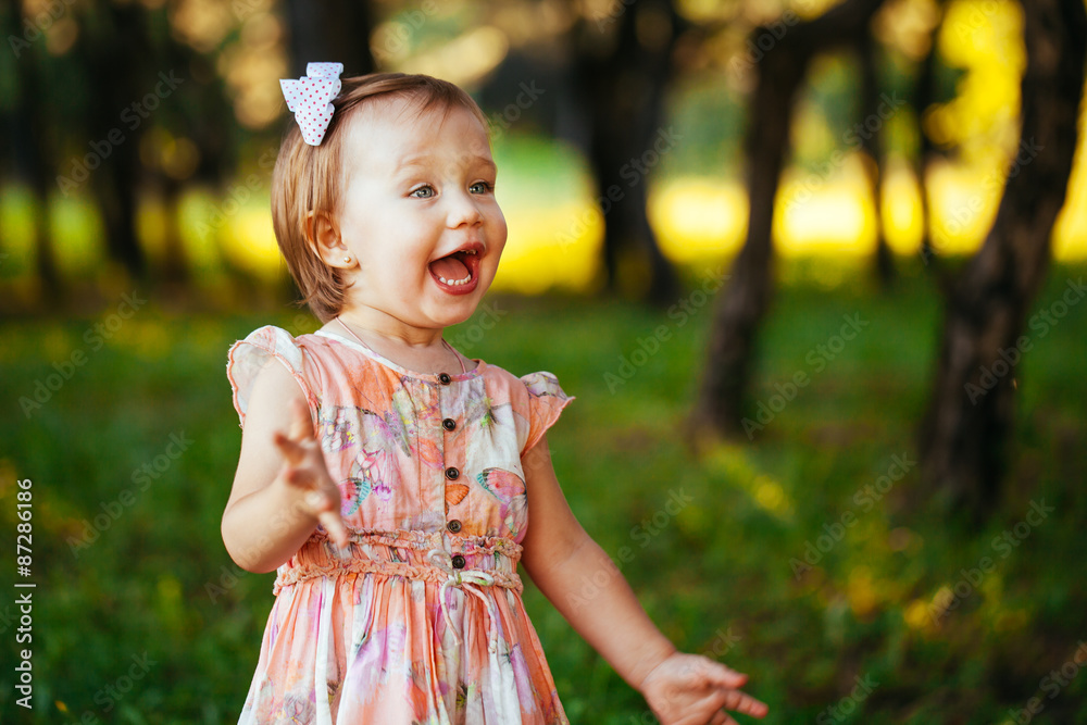 Outdoor portrait of adorable smiling little girl in summer day Outdoor portrait of adorable smiling little girl in summer day