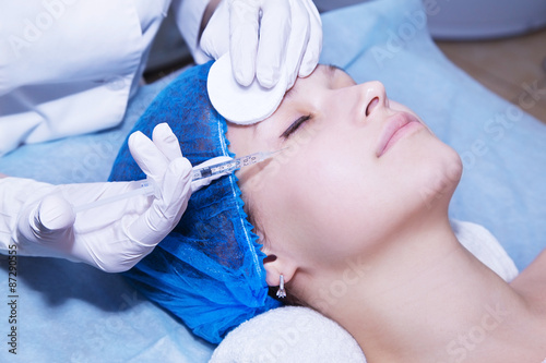 Young woman in a beauty salon skin rejuvenation process