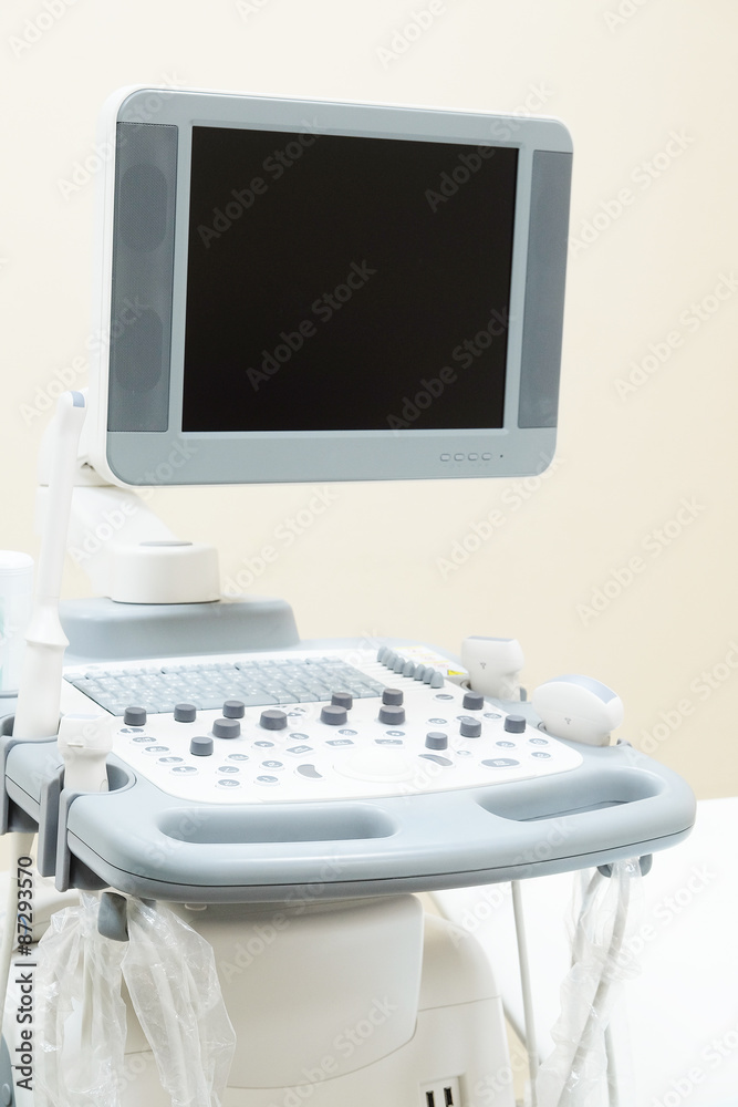 Interior of medical room with ultrasound diagnostic equipment Interior of medical room with ultrasound diagnostic equipment