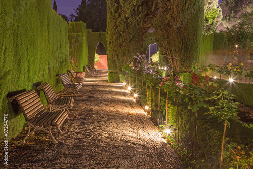 GRANADA, SPAIN - MAY 30, 2015: The Generalife gardens of Alhambra palace at dusk.