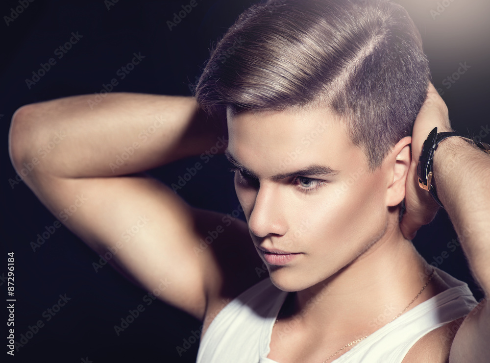 Obraz premium Handsome young man. Fashion young model man portrait