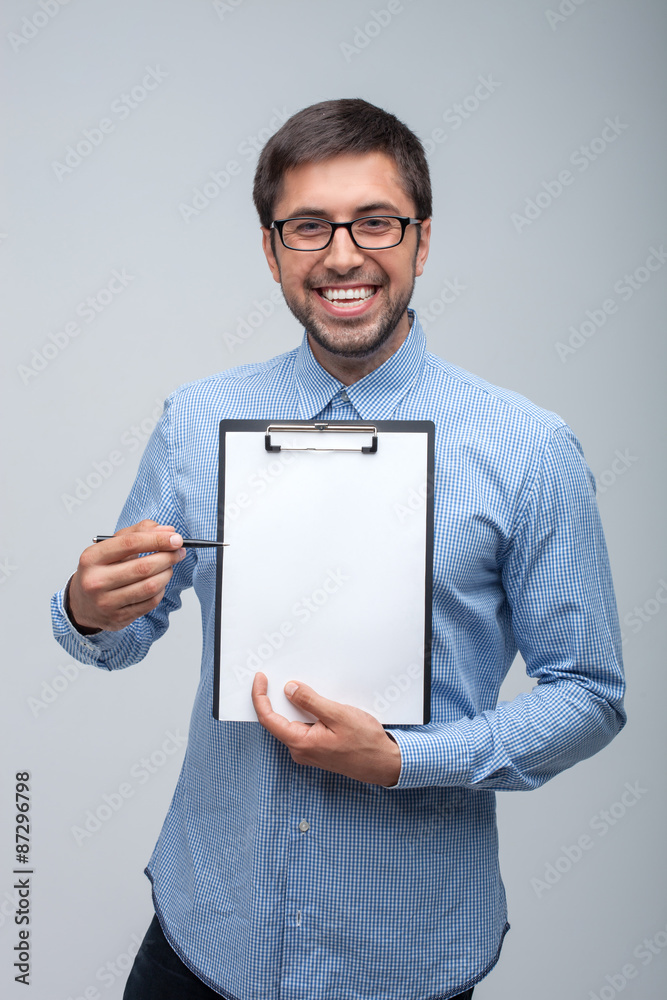 Successful male worker is ready to sign a contract Successful male worker is ready to sign a contract