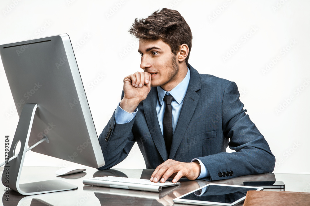 Entrepreneur looking at computer screen with horror Entrepreneur looking at computer screen with horror