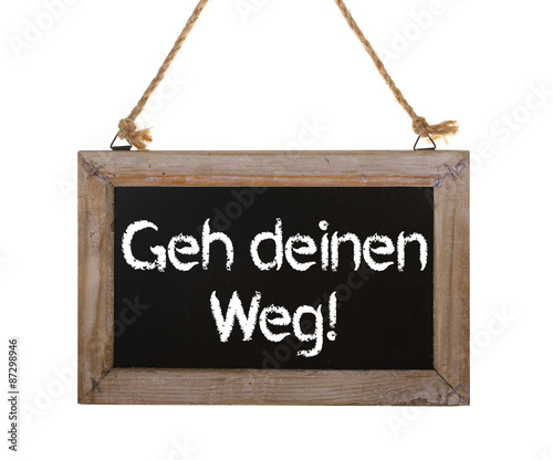 Geh deinen Weg! Holzschild freigestellt photo