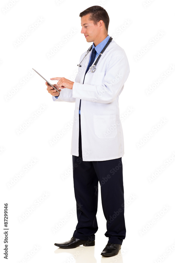 young medical doctor using tablet computer