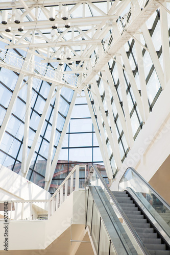 escalator and glass roof in style hi-tech