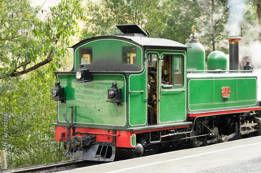 Century-old steam train Green rear view Century-old steam train Green rear view