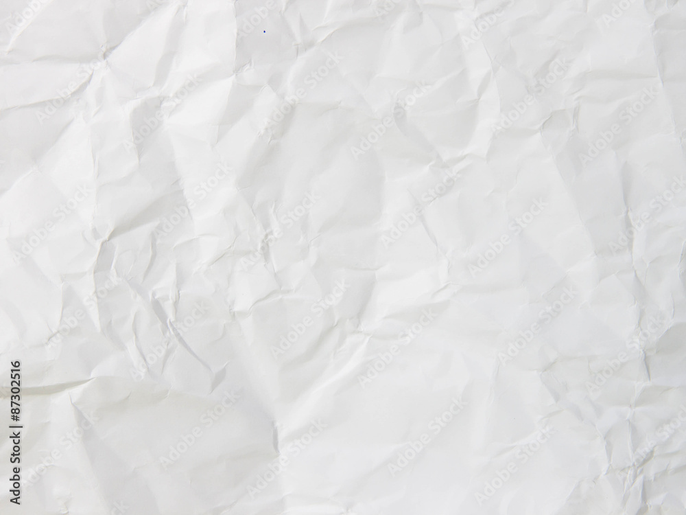 Crumpled paper texture pattern background in light white color t