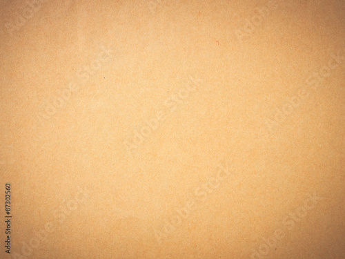 Recycled paper texture pattern background in light brown color