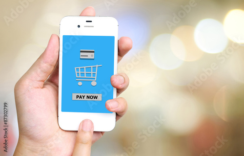 Buy now on smart phone screen in hand, e-business concept