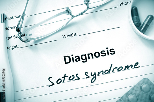 Diagnostic form with diagnosis Sotos syndrome and pills.