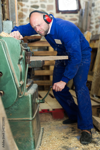 employee works on the machine