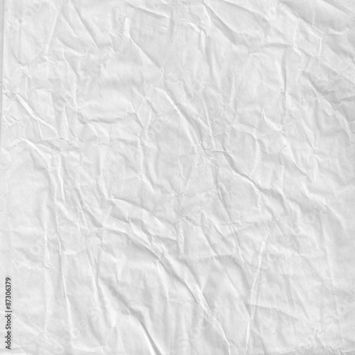 Crumpled paper sheet. Wrapping-paper texture. photo