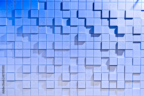 White and blue background of regularly shaped wooden blocks