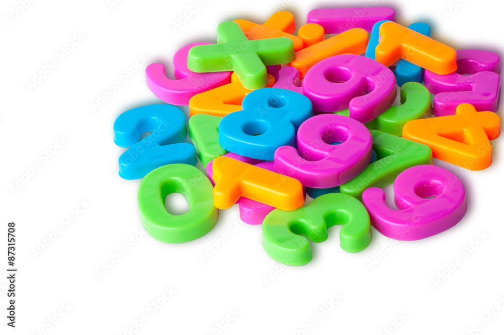 Fototapeta premium Colorful magnetic digits on refrigerator