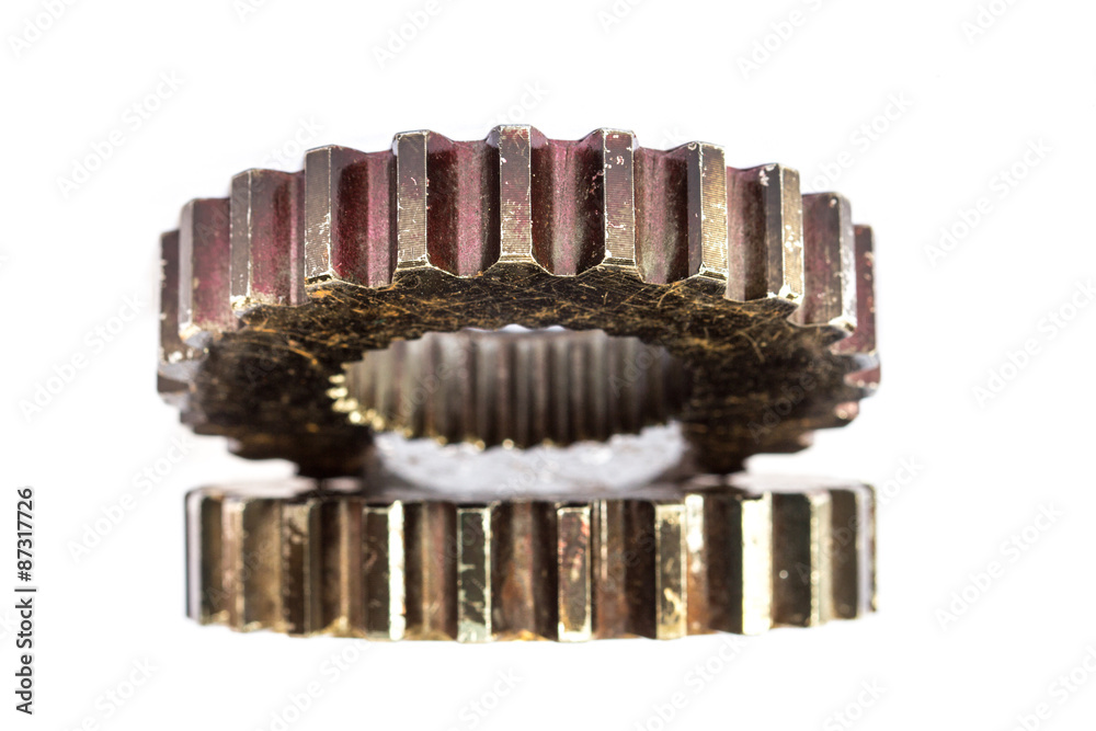 Closeup of steel gears meshing together Closeup of steel gears meshing together