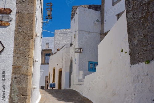Fototapeta Naklejka Na Ścianę i Meble -  The UNESCO listed village of Chora on Patmos Island Greece at the base of the monastery of St John.