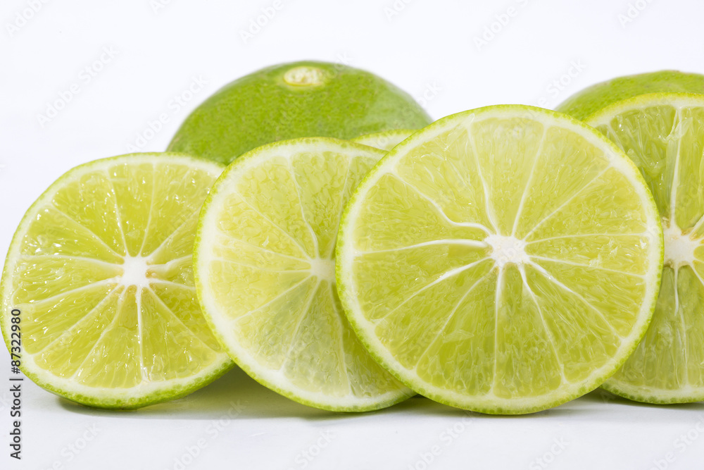 lime slice and lemon on white background