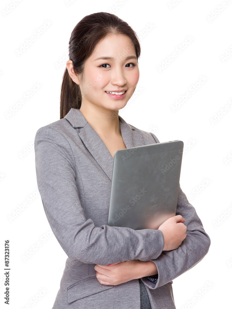 Young Businesswoman hold with notebook computer Young Businesswoman hold with notebook computer