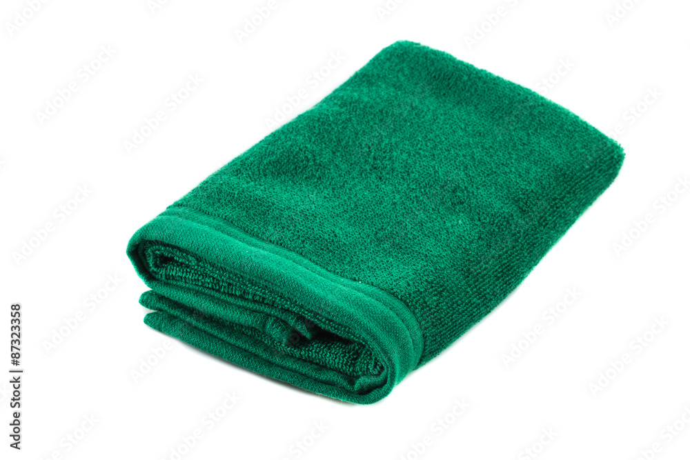 Green soft bath towel isolated on white background Green soft bath towel isolated on white background