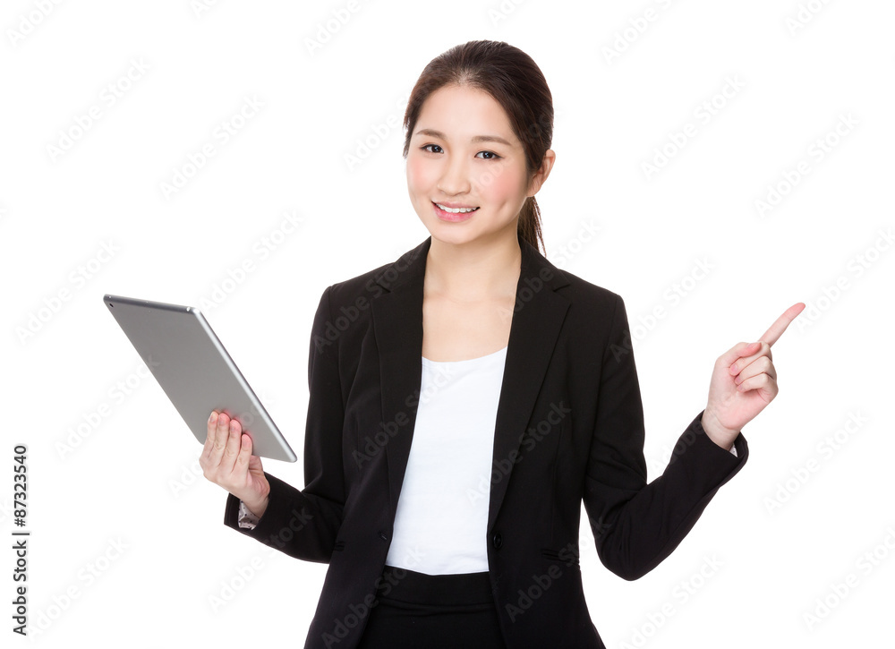 Businesswoman hold with tablet and finger point up Businesswoman hold with tablet and finger point up