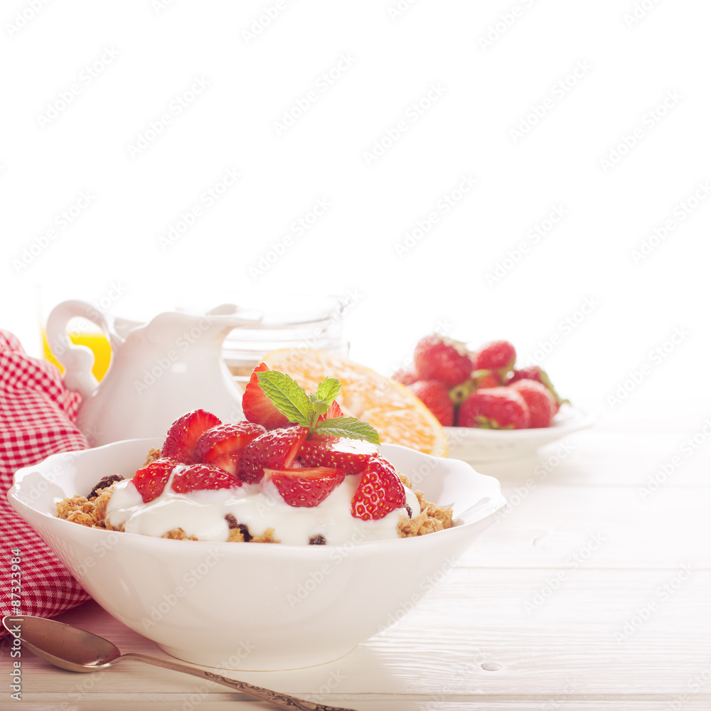 Yogurt with granola and fresh strawberries Yogurt with granola and fresh strawberries