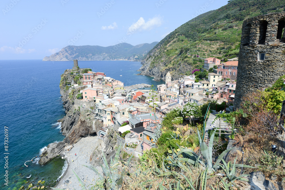Scenic view of colorful village Vernazza and ocean coast