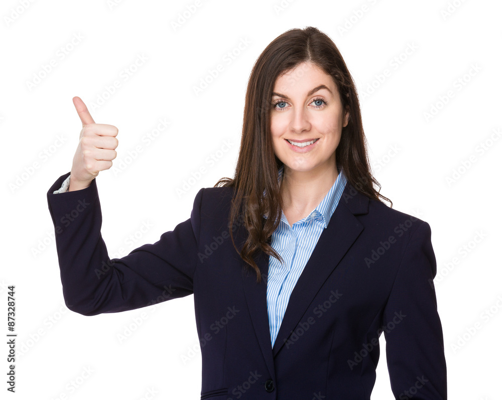 Brunette businesswoman with thumb up Brunette businesswoman with thumb up