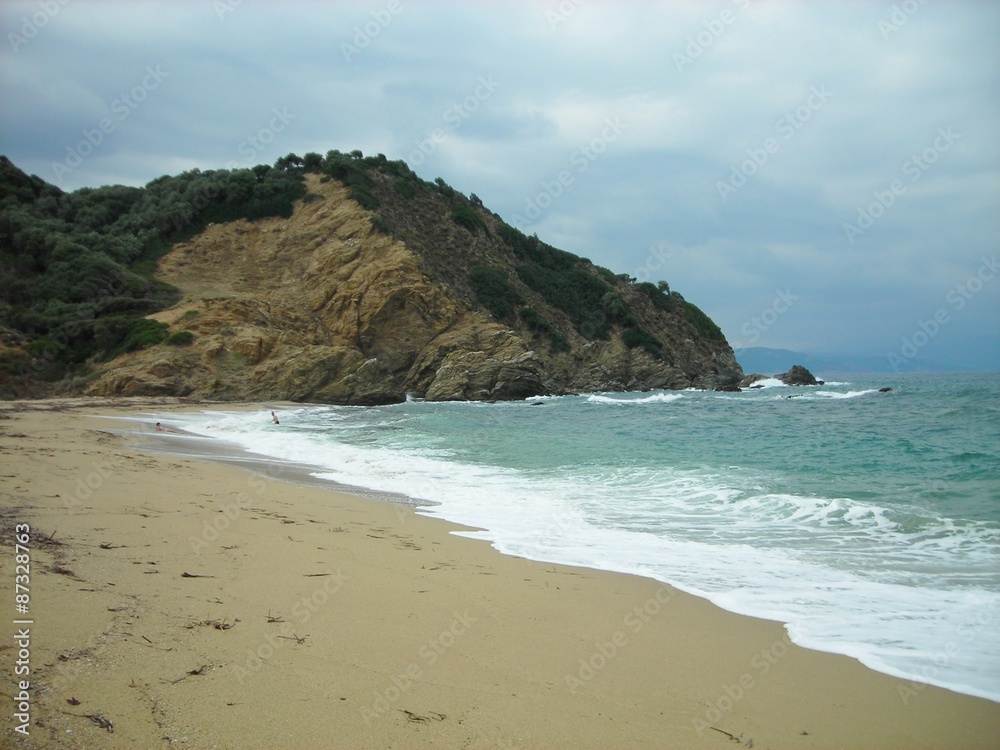 Megalos Aselinos beach at Skiathos island, Greece, on a cloudy, windy day in early autumn.