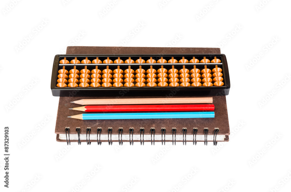 Abacus with pencil and notebook isolated on white background Abacus with pencil and notebook isolated on white background