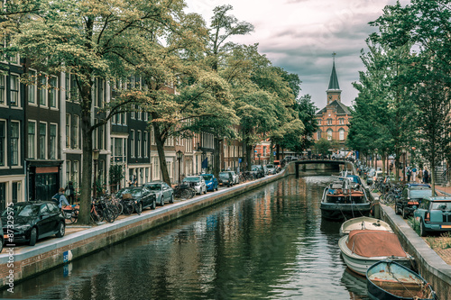 Amsterdam canal and typical houses, Holland © Kavalenkava