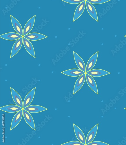 Multicolor geometric flower pattern on blue background, seamless